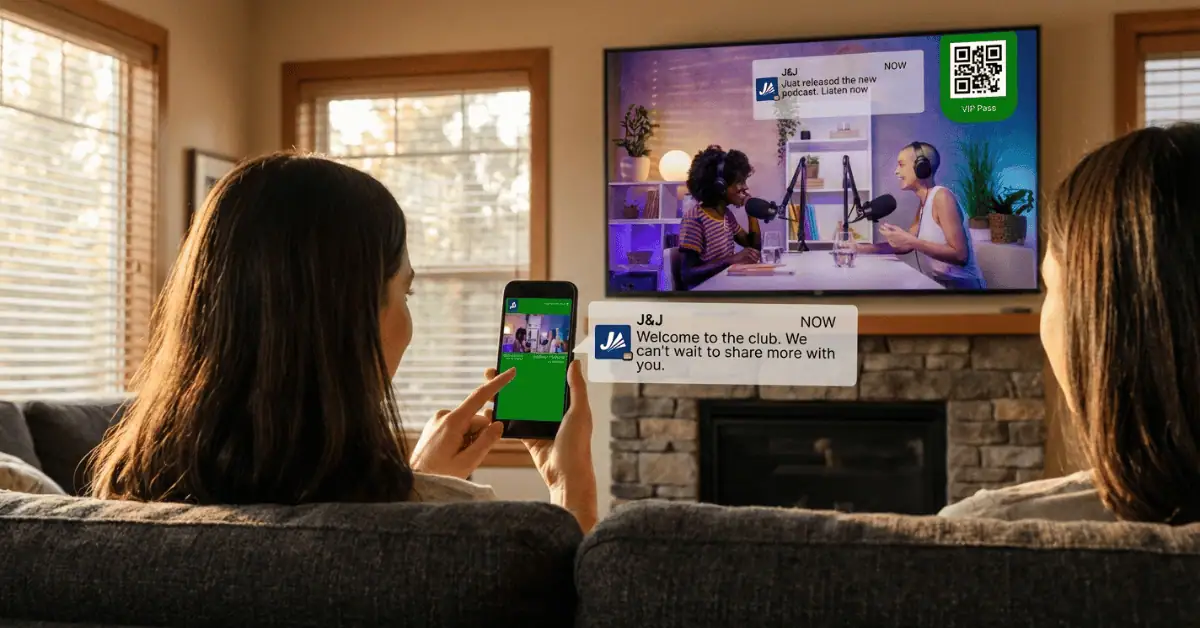 People watching YouTube on a TV while using their phones, showing why influencer attribution breaks down in a lean-back viewing environment